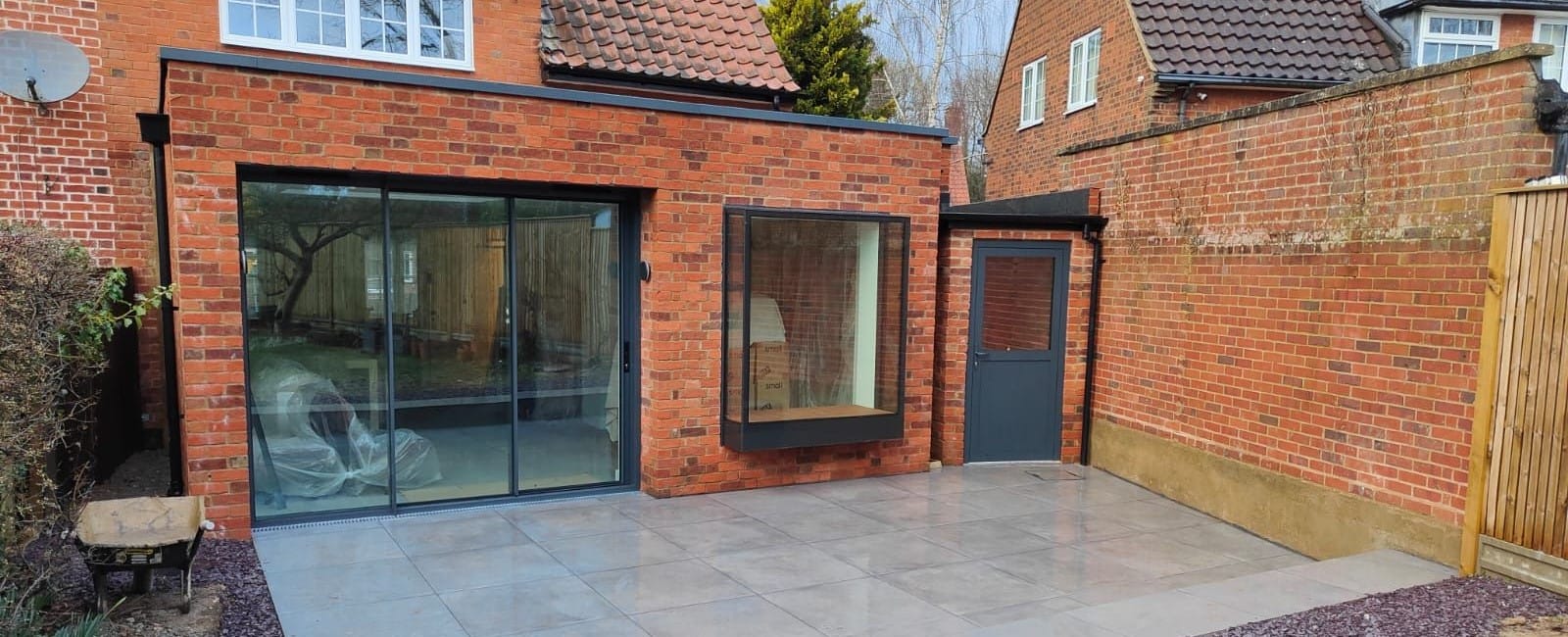 Oriel window and aluminium doors